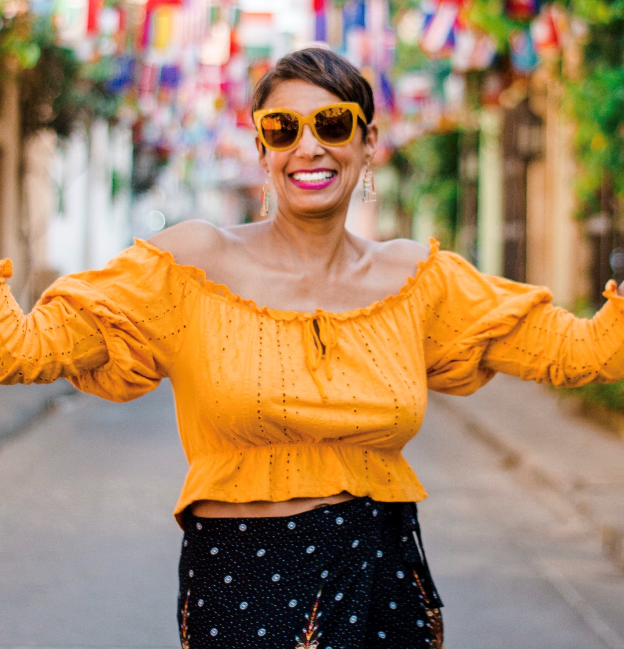 Picture of a black woman in a gold top