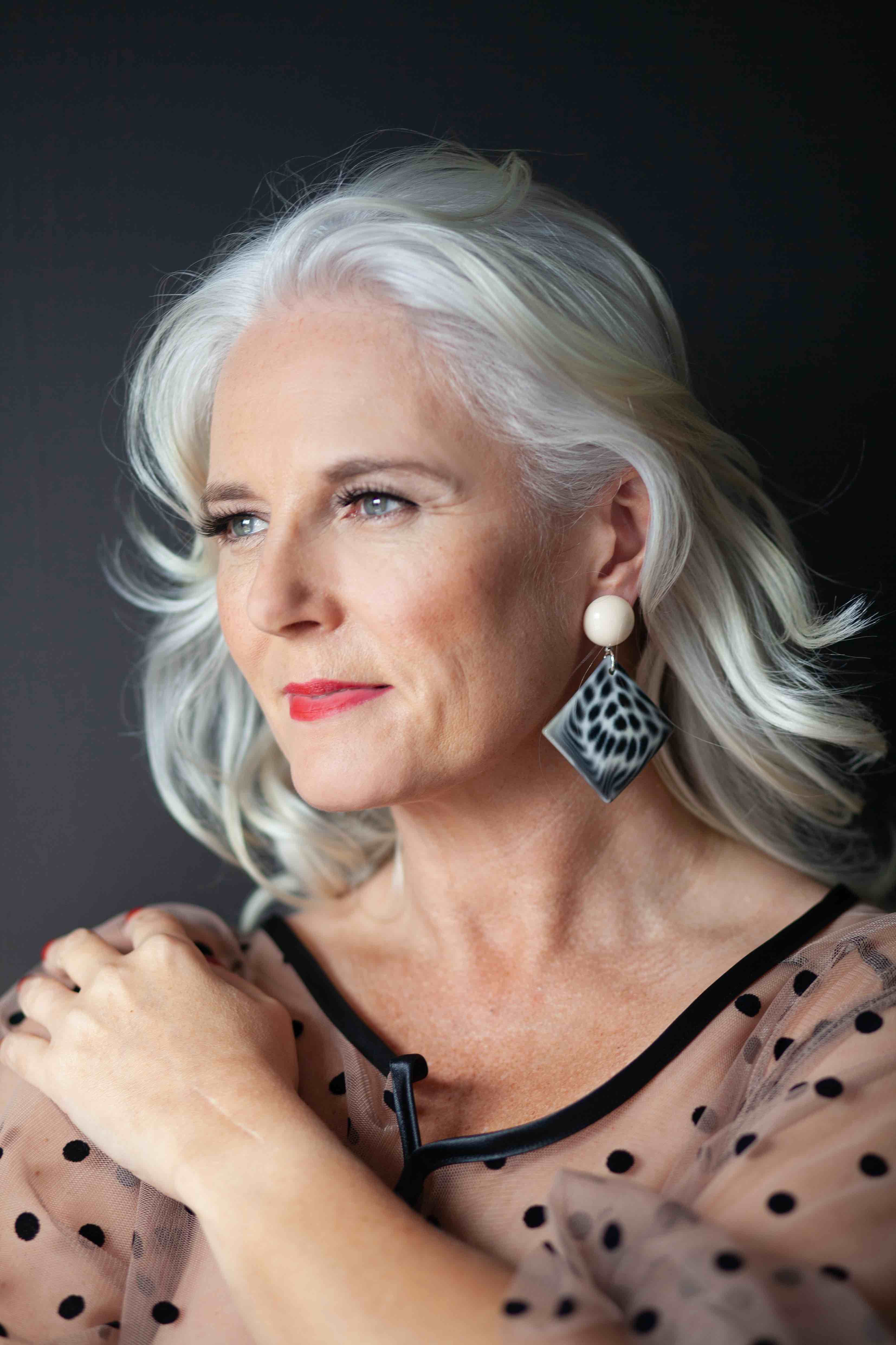 Pictures of Rachel Peru, a woman with silver hair