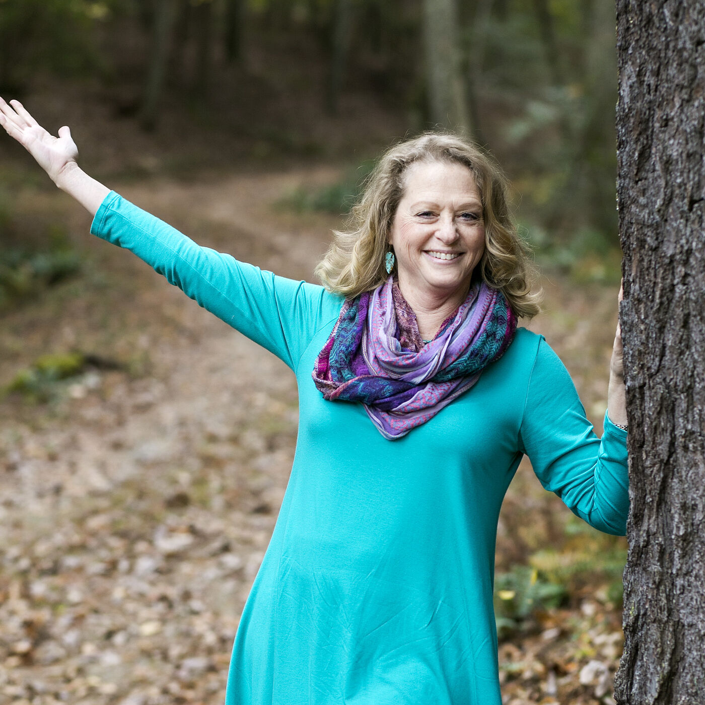 Picture of Wendy Green in a blue dress. She is reinventing herself in her 60s.