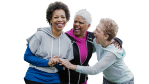 Menopause - a time when women can rejoice - there are new possibilities to find joy during this pivotal period. This image shows three midlife women joyfuly smiling as they talk.