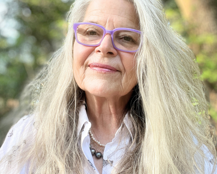 Picture of Reinvention Rebel Nina Zapala, a 66-year old woman with long silver hair