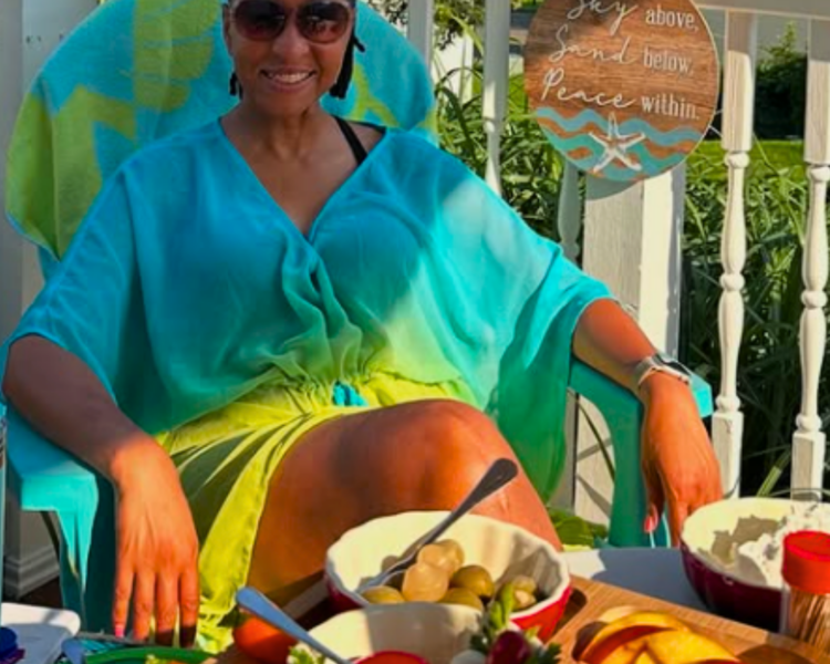 Picture of Wendy sitting in a chair looking relaxed and slowing down
